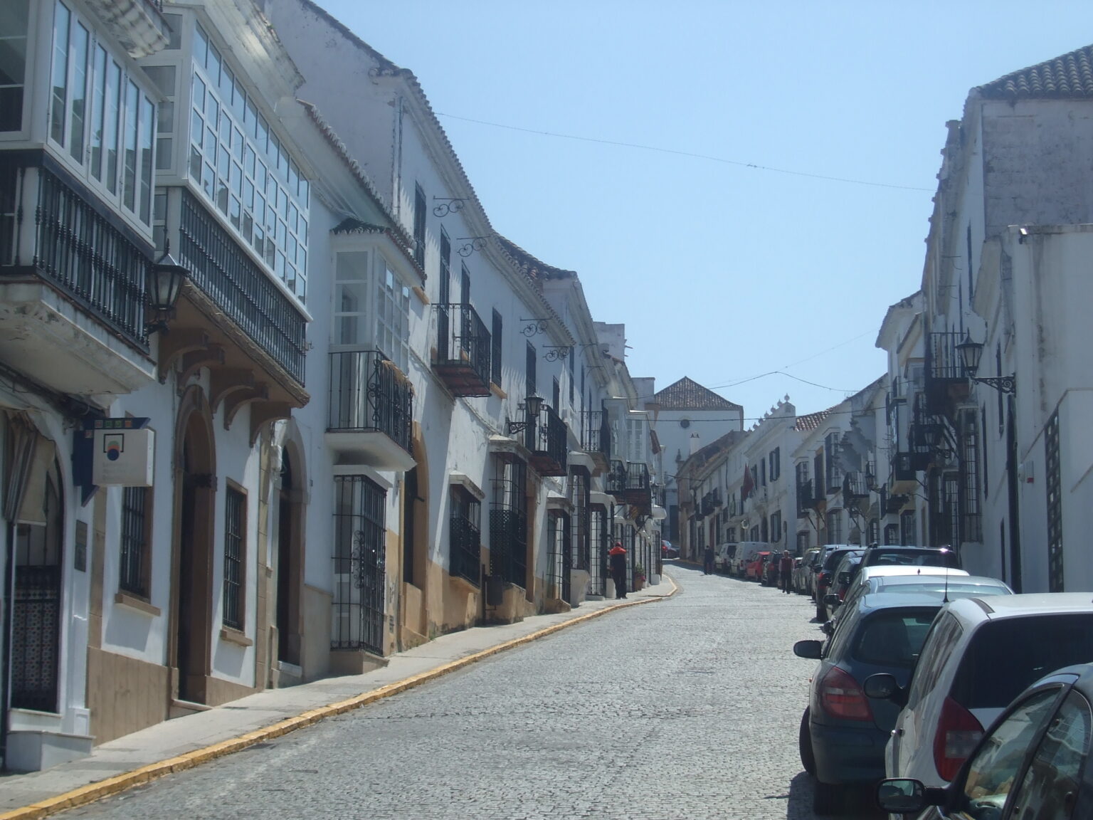 Historic façades along Calle San Felipe in San Roque